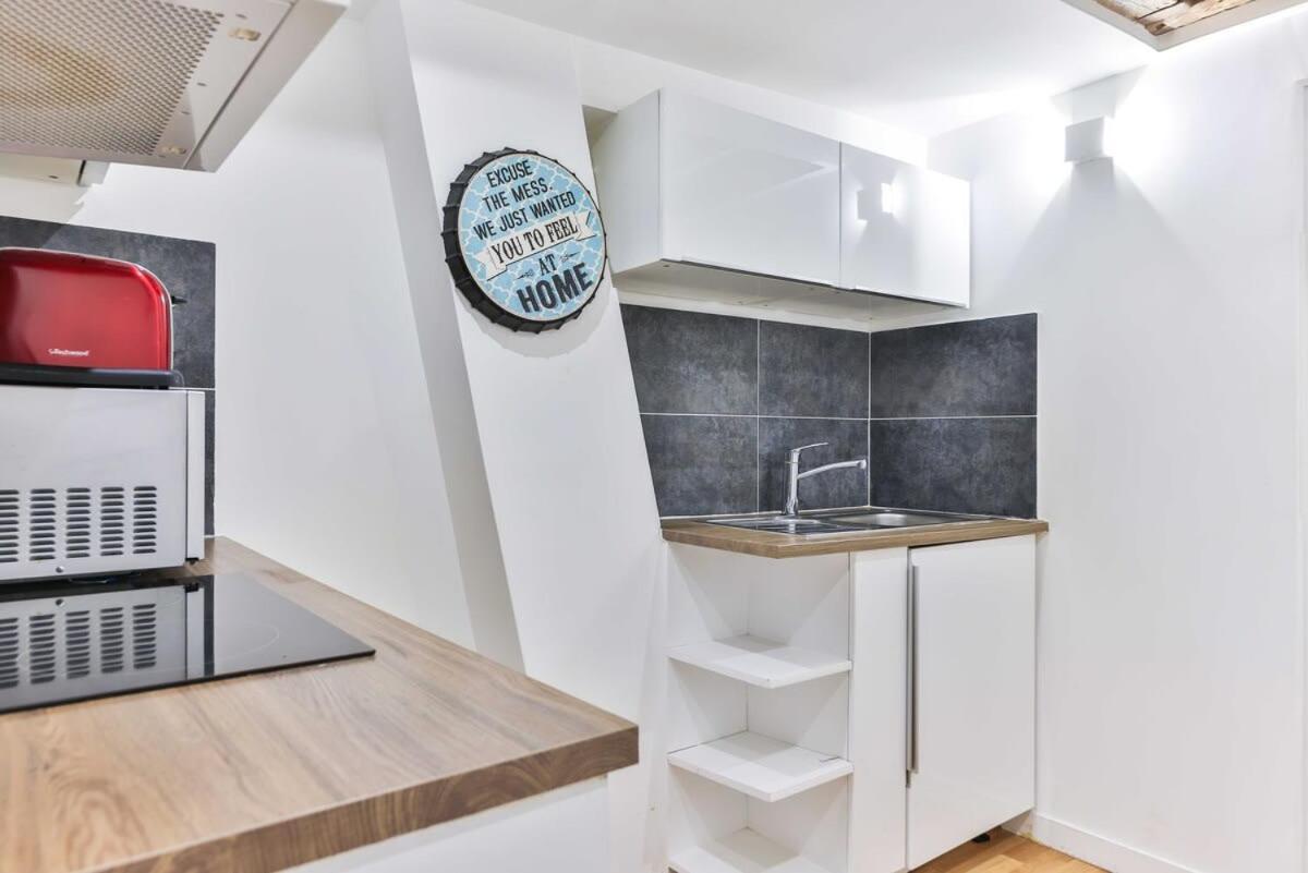 Dazzling Studio Caire Apartment Paris Bagian luar foto