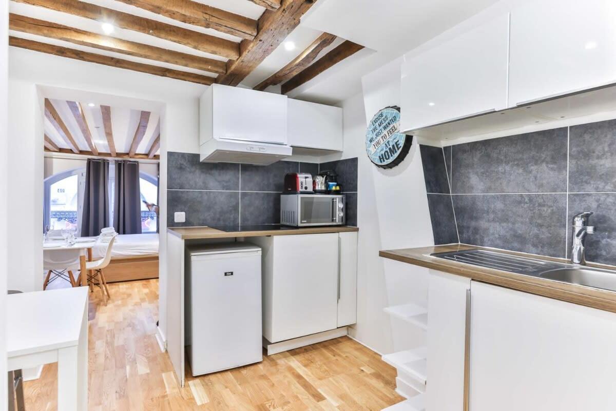 Dazzling Studio Caire Apartment Paris Bagian luar foto